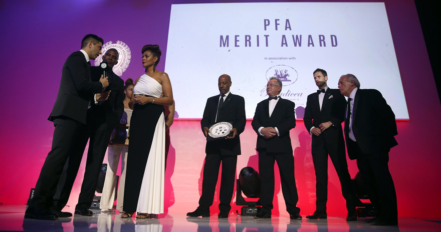 Family members collect the PFA Merit Award after it is awarded posthumously to Cyrille Regis during the 2018 PFA Awards at the Grosvenor House Hotel, London.