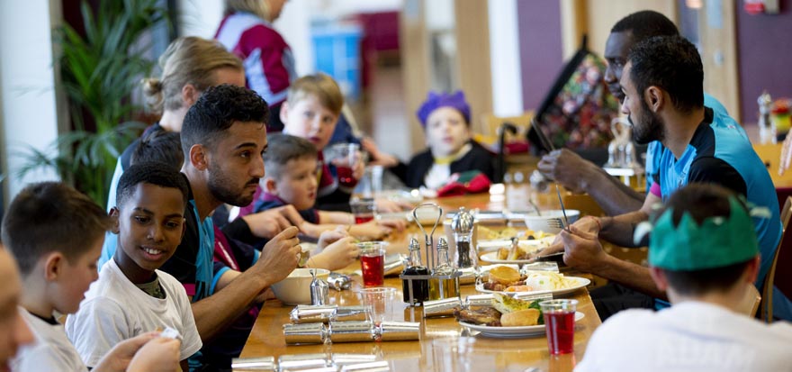 Aston Villa squad having Christmas dinner with local youngsters