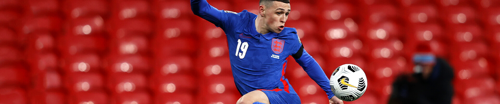 Player kicking a football