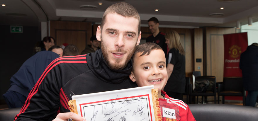 David de Gea with a young fan
