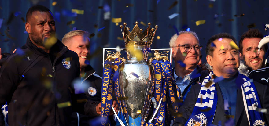 Vichai Srivaddhanaprabha (right) celebrate with the Barclays Premier League trophy on stage at Victoria Park