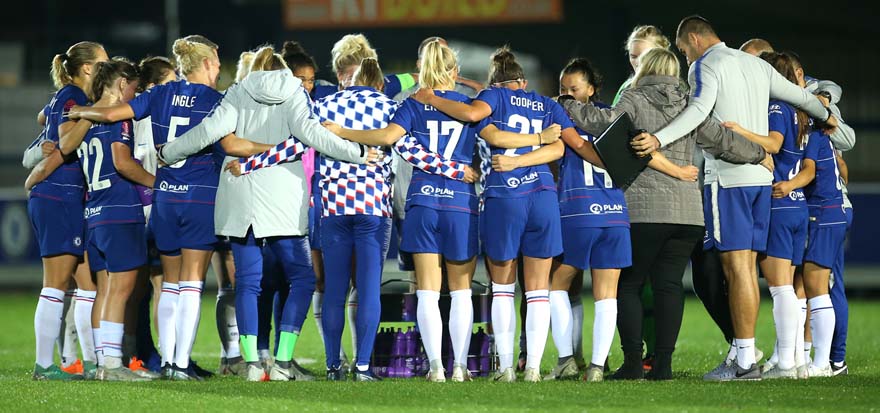 Chelsea Women huddle after final whistle